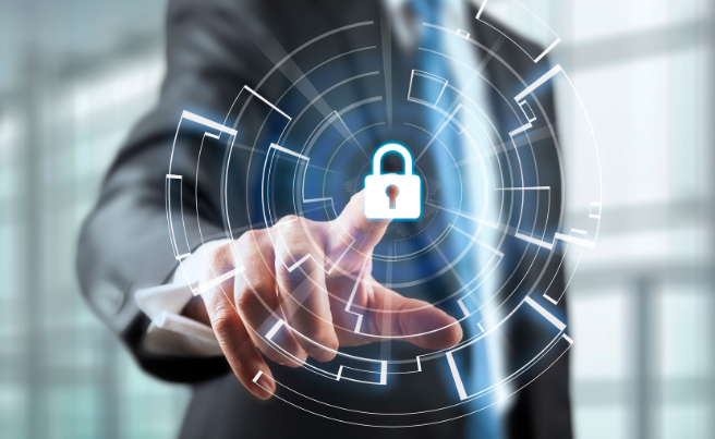 Businessman in suit pointing at a glowing padlock icon surrounded by digital circular graphics