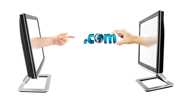 Two computer monitors facing each other with hands reaching out, passing a .com domain symbol representing domain name transfer