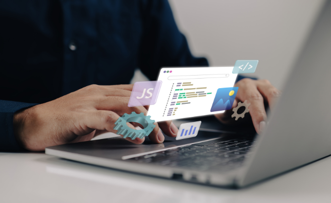 Hands typing on a laptop keyboard with floating digital icons representing coding and data analytics