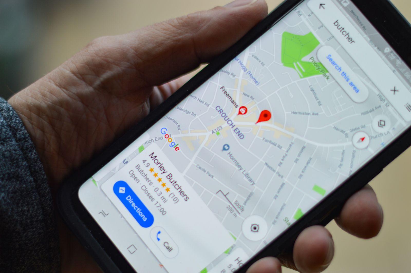 Smartphone displaying a map with a local search for 'butcher', showing Morley Butchers with ratings and directions