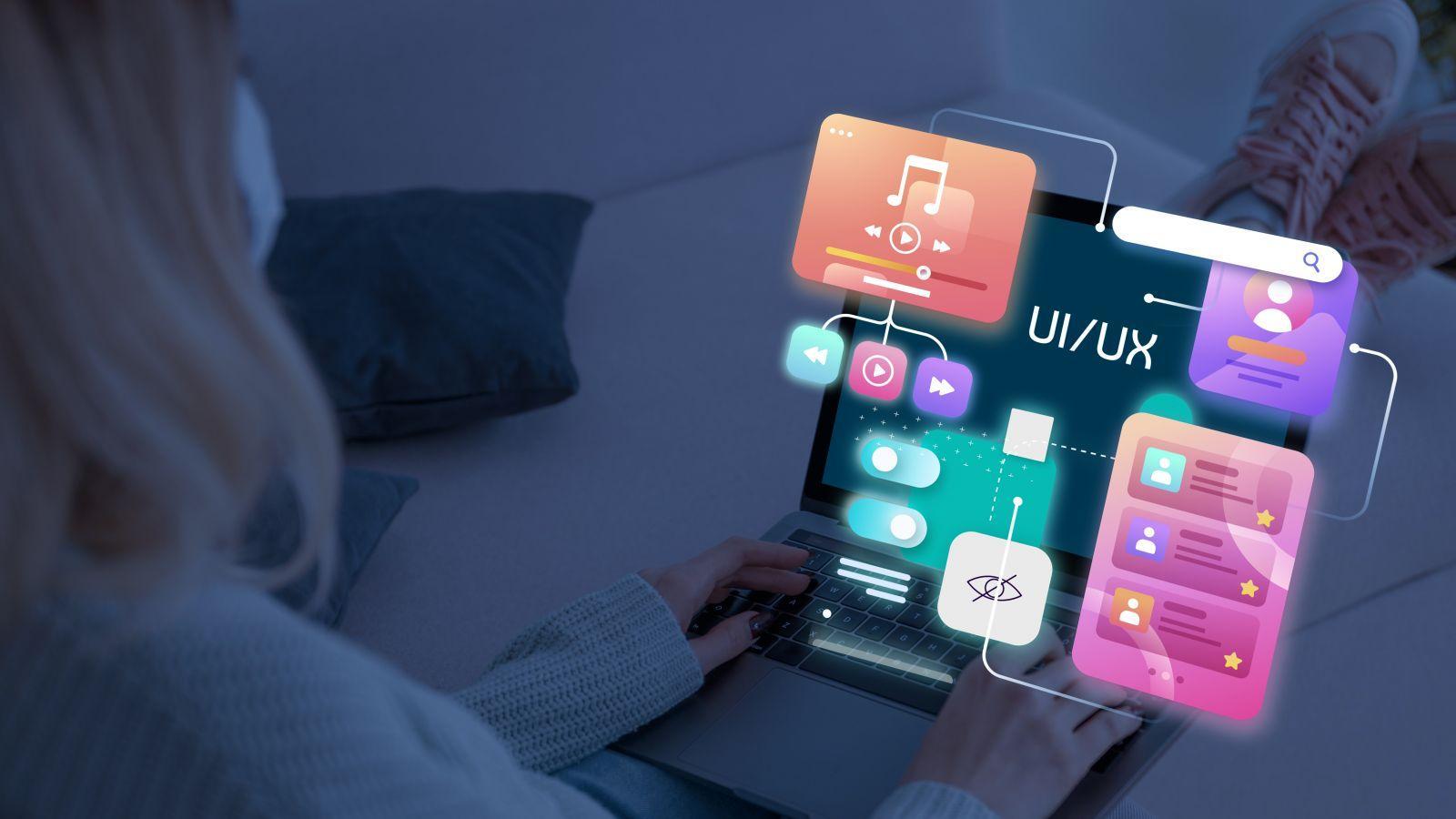 Person using laptop with floating digital interface elements showing UI/UX design icons and music player graphics