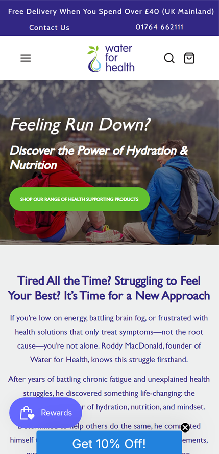 Mobile website homepage for Water For Health showing a banner with two hikers in outdoor gear and text promoting hydration and nutrition products