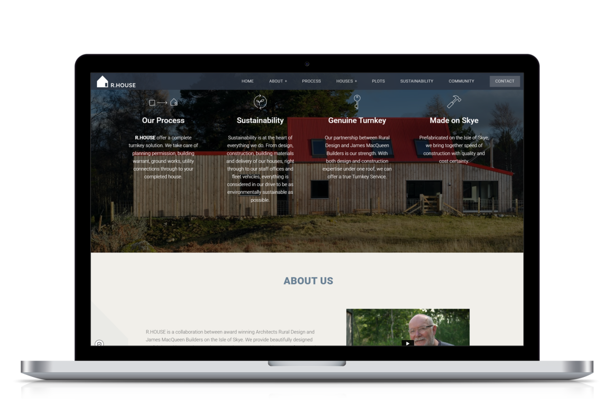 Laptop showing the R.HOUSE website homepage featuring a modern rural house with sections on process, sustainability, turnkey service, and local construction
